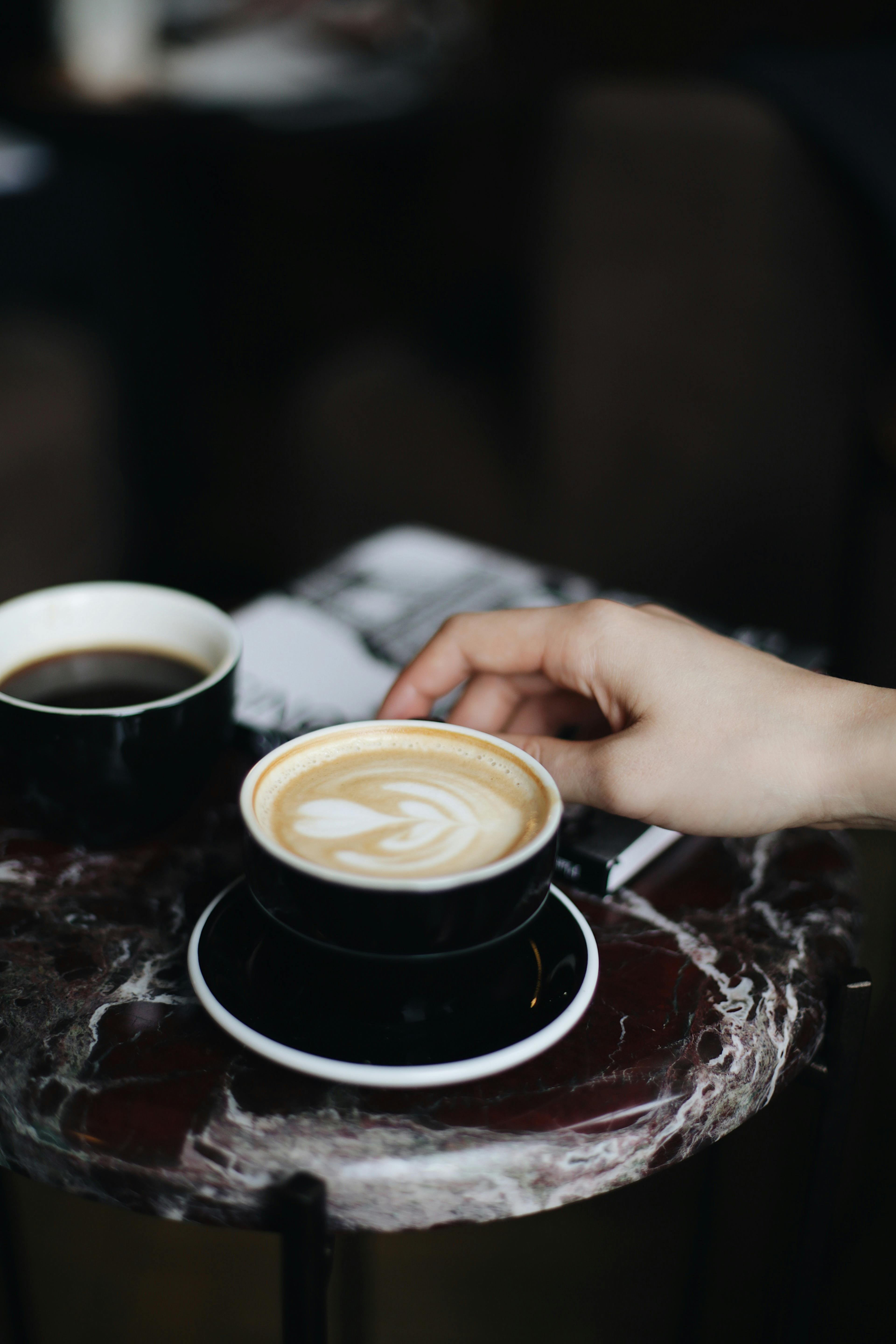 lady holding pretty latte